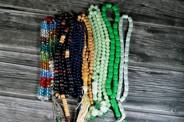 stock image Prayer beads, a form of beadwork used to count the repetitions of prayers, A misbaha, a device used for counting tasbih zekr Islamic prayers praising Allah, has 2 forms 99 beads and 33 beads