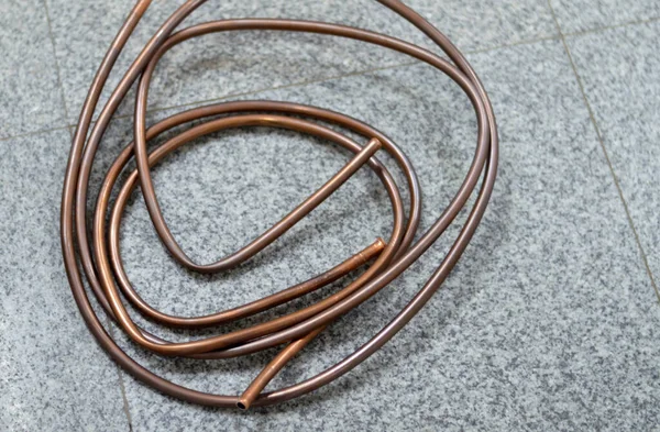 Air conditioning copper pipes tubes without  the black rubber cover, copper tubing  is most often used for heating systems and as a refrigerant line in heat, ventilation and air conditioning systems