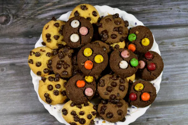 Chocolate butter cookies, loaded with peanut butter, chocolate chips, traditional chocolate chip cookies with chunks, cookies used for tea time beside hot drinks, delicious pastries with choco chips