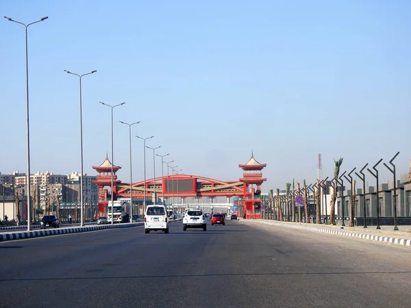 stock image Cairo, Egypt, September 10 2023: Shinzo Abe axis patrol highway in Egypt with a pedestrian bridge finished in traditional Japanese architectural style, the traffic highway named on former Japanese PM