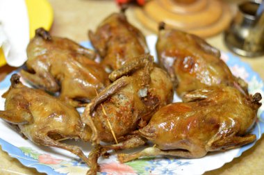Roasted and fried pigeons stuffed with white rice or Hamam mahshi, boiled until cooked then roasted, fried in hot oil or grilled, stuffed pigeons is a very popular Egyptian cuisine in Egypt clipart