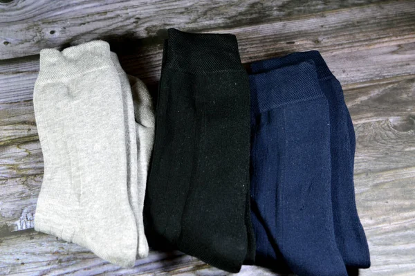 men socks, a sock is a piece of clothing worn on the feet and often covering the ankle or some part of the calf, Socks can be created from a wide variety of materials, such as cotton, wool, nylon