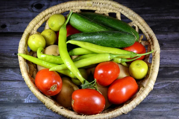 Vegetables, parts of plants that are consumed by humans or other animals as food, healthy diet, weight loss concept, pile of various vegetables, tomatoes, cucumbers, green peppers, lemons and potatoes