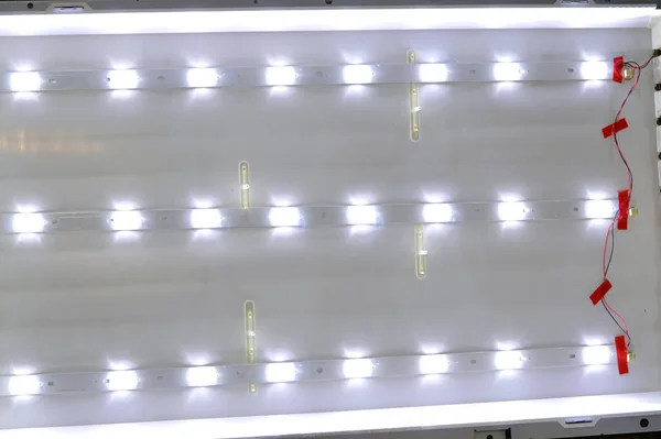 Installing Led light strips as a backlight for a TV television device, transforming and converting LCD fluorescent lamps to LED backlight strips, maintenance of TV lights technology, selective focus