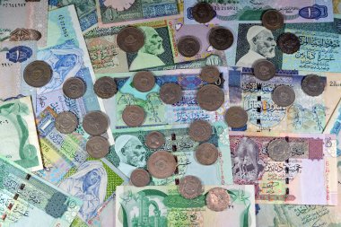 Libya 'nın eski para banknotlarının geçmişi, Libya Krallığı' ndan Jamahiriya 'ya kadar farklı dönemlerden gelen banknotlar ve madeni paralar, Libya' nın eski antika para birimi, değeri, döviz kuru