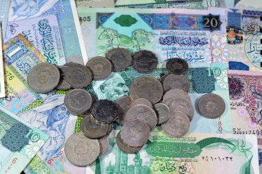 Libya 'nın eski para banknotlarının geçmişi, Libya Krallığı' ndan Jamahiriya 'ya kadar farklı dönemlerden gelen banknotlar ve madeni paralar, Libya' nın eski antika para birimi, değeri, döviz kuru