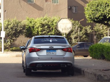 Kahire, Mısır, 14 Kasım 2023: Filistin 'in arka camında Filistin bayrağı, Mısır plaka numarası, harita, bayrak, destek işareti ve sembolü bulunan Filistin' in Arapça kelimesi