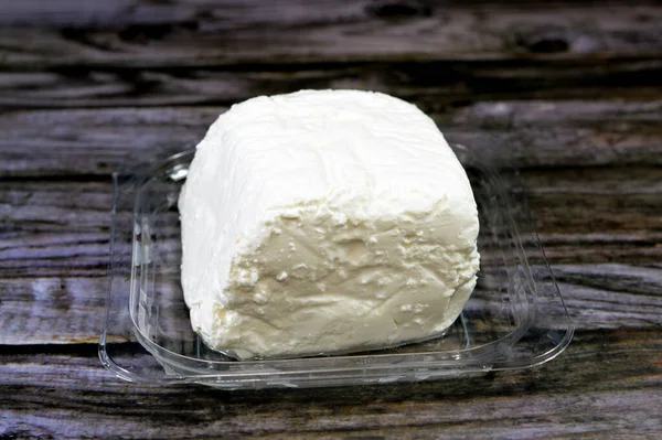 A cube of low salt white cheese, a savory twist to a variety of recipes, used for preparing salads, pizza, sandwiches, pasta and more, rich nutrient and proteins that boost immunity and metabolism
