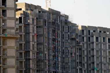 Giza, Mısır, 7 Ocak 2024: Mısır 'da yeni yerleşim yerleri, gayrimenkul gelişimsel konutlar ve daireler modern proje, Zed Z şehrinin inşaat alanı Şeyh Zayed şehir Giza Orascom CO tarafından
