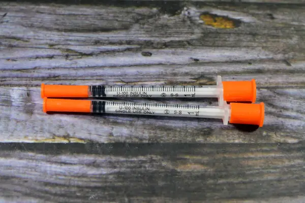 an insulin needle syringe, used to administer the Insulin dose to type 1 Diabetes mellitus ( insulin dependent) and some cases of type 2 (non insulin dependent), for subcutaneous route
