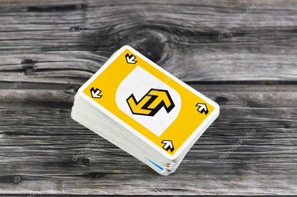 Cairo, Egypt, January 23 2024: UNO card game, a proprietary American shedding-type card game originally developed in 1971 by Merle Robbins in Reading, Ohio, derived from the crazy eights card games