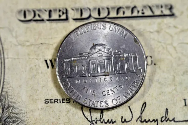 Monticello the primary plantation of Thomas Jefferson the founding father and 3rd president of USA from the reverse side of American money coin of 5 five cents 2016, on old USA  dollar series 1935