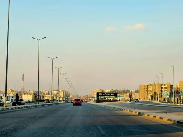 stock image Cairo, Egypt, March 23 2024: Shinzo Abe axis patrol highway sign board in Egypt, the traffic highway is named on former Japanese prime minister, Shenzo Abe road in Egypt, selective focus