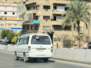 Cairo, Egypt, April 4 2024: Cairo transportation vehicles for passengers, minibus, microbus, or minicoach, a passenger-carrying motor vehicle that is designed to carry more people than a minivan clipart