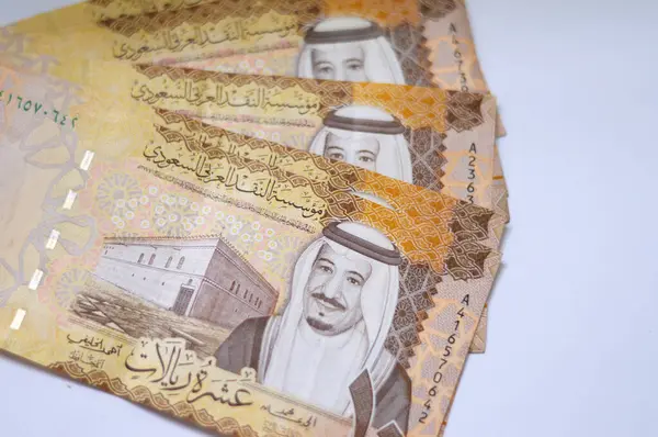 stock image Saudi Arabia 10 SAR ten Saudi riyals cash money banknote with the photo of king Abdullah Bin AbdulAziz Al Saud, Murabba palace and King AbdulAziz Financial District in Al Aqeeq area of Riyadh