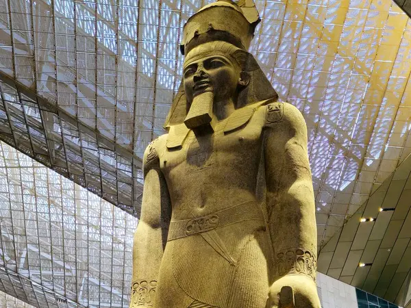 stock image Giza, Egypt, April 13 2024: Ramses II from The Grand Egyptian Museum GEM, an archaeological museum under construction in Giza, Egypt, near the Giza pyramid complex, Giza Museum of Ancient Egypt