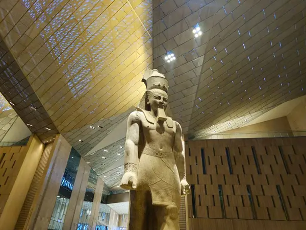 stock image Giza, Egypt, April 13 2024: Ramses II from The Grand Egyptian Museum GEM, an archaeological museum under construction in Giza, Egypt, near the Giza pyramid complex, Giza Museum of Ancient Egypt