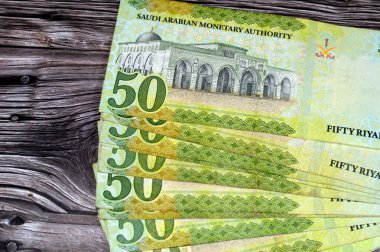 50 fifty Saudi riyals banknote features the dome of the rock in Jerusalem and portrait of king Salman Bin AbdelAziz Al Saud and Al Aqsa mosque in Jerusalem, Saudi Arabia currency, selective focus clipart