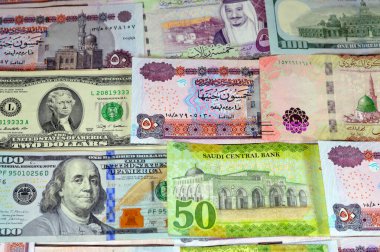 USD American dollars cash, Saudi Arabia money banknotes bill of different value riyals of King Salman Bin AbdulAziz Al Saud era and Egyptian pounds notes, Saudi and Egypt money exchange rate clipart