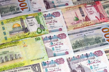 American dollars USD cash, Saudi Arabia money banknotes bill of different value riyals of King Salman Bin AbdulAziz Al Saud era and Egyptian pounds notes, Saudi and Egypt money exchange rate clipart