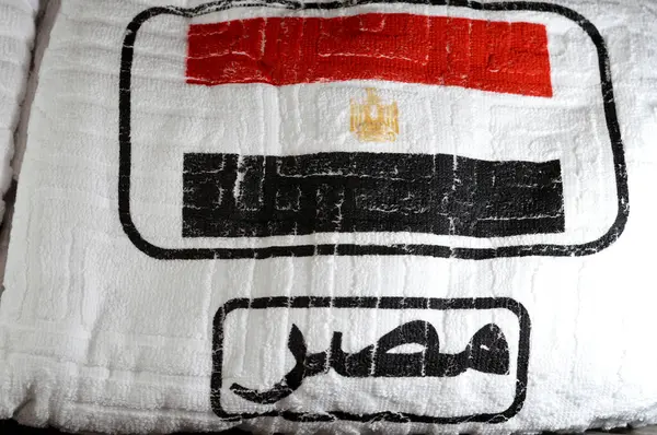 stock image Translation of the Arabic text ( Egypt ), Ihram clothing Ahram with the Egyptian flag, worn by Muslim people while in a state of Iram, during either of the Islamic pilgrimages, Hajj and or Umrah