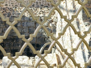 Al Ghars well, a historical site linked to prophet Muhammed peace be upon him, lined with basalt stones, surrounded by building foundations, near Quba mosque, Prophet was said to have drunk from it clipart