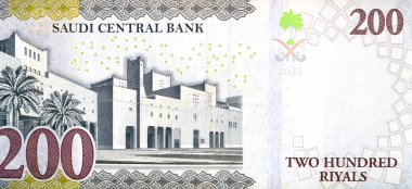 200 SAR 200 Suudi Arabistan riyalist banknotunun büyük bir kısmı, Riyad City 'de Qasr Al Hukm' a ait, resmin üzerinde banka adı ve sağında da banknot var.