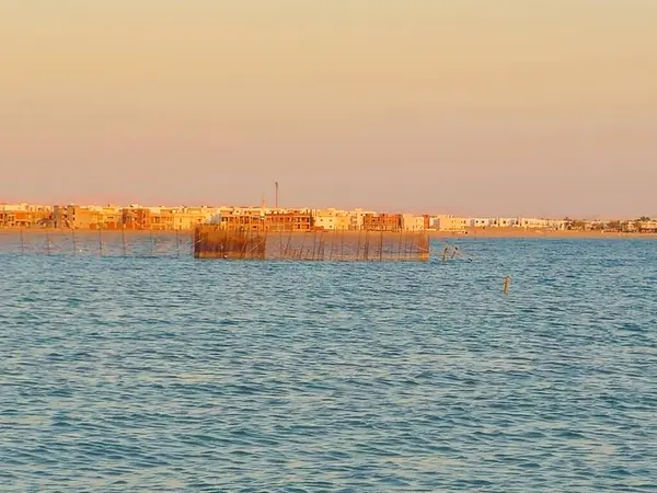 stock image Fish traps inside the red sea, with wooden frames, the idea is to let fishes inside it and it's hard to get out of the trap, fishing in the red sea concept