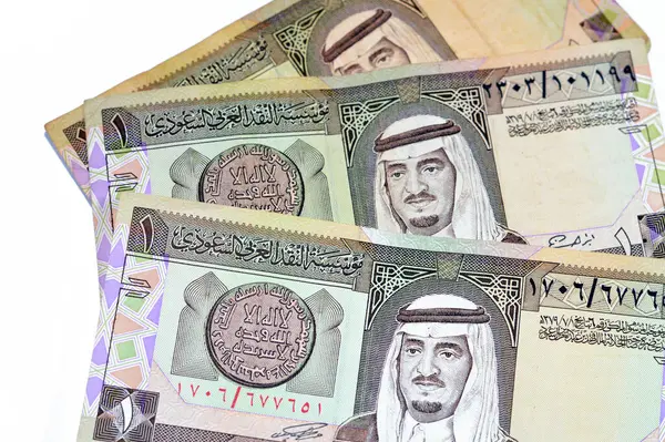 stock image The obverse side of an old Saudi Arabia banknote bill, one 1 Riyal SAR features Fahd bin Abdulaziz Al Saud, Custodian of the Two Holy Mosques and the King of Saudi Arabia from 1982 to 2005