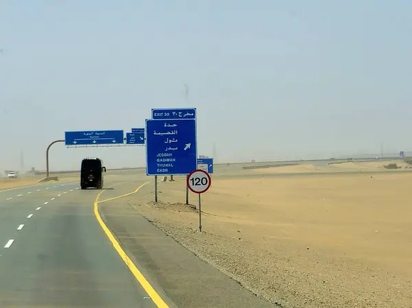 stock image Makkah Madinah road, Saudi Arabia, June 25 2024: Qadimah, Jeddah, Badr and Thuwal road sign at Mecca Medina highway road, Tourism and pilgrimage concept in kingdom of Saudi Arabia