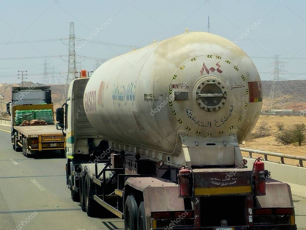 Makkah Madinah road, Saudi Arabia, June 25 2024: A big truck lorry with a container tank with fuel petroleum products, GASCO tanker National Gas and Industrialization Company in Saudi Arabia