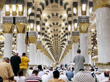 Medina, Saudi Arabia, June 28 2024: The interior of The Prophet's Mosque or Al Masjid Al Nabawi, a major site of pilgrimage that falls under the purview of the Custodian of the Two Holy Mosques clipart