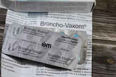 Cairo, Egypt, October 4 2024: Broncho-Vaxom Children capsules 3.5mg immunotherapy of respiratory tract infection, treatment, control, prevention an improvement of respiratory tract infection clipart