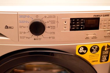 Cairo, Egypt, November 5 2024: Zanussi front loading PerlaMax 8 KG Silver 1200 RPM Steam washing machine, Zanussi is an Italian producer of home appliances that was bought by Electrolux in 1984 clipart