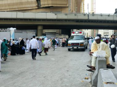 Mecca, Saudi Arabia, June 23 2024: an ambulance for emergency calls of the ministry of health of Saudi Arabia in Makkah region during pilgrimage season, ambulance for pilgrims in Mecca city clipart