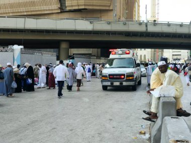 Mecca, Saudi Arabia, June 23 2024: an ambulance for emergency calls of the ministry of health of Saudi Arabia in Makkah region during pilgrimage season, ambulance for pilgrims in Mecca city clipart