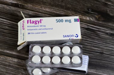 Cairo, Egypt, November 27 2024: Flagyl metronidazole 500mg tablets, Amebicides, an antibiotic that is used to treat bacterial infections of the vagina, stomach, liver, skin, joints, brain, spinal cord