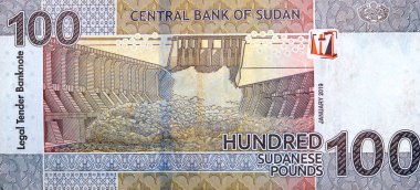 Sudan 2019 Merkez Bankası tarafından verilen 100 pound 'un büyük bir ters tarafında 2009 yılında açılan Merowe hidroelektrik baraj nehri Nil, Sudan para banknotu yer alıyor.