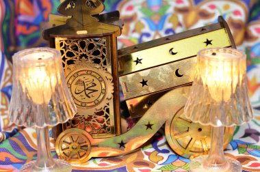 table mini lamp, portable lamps, illuminated lantern, light fixture or fitting and an Iftar breakfast cannon and lantern fanous decoration, Translation of Arabic (Mohamed peace be upon him) clipart