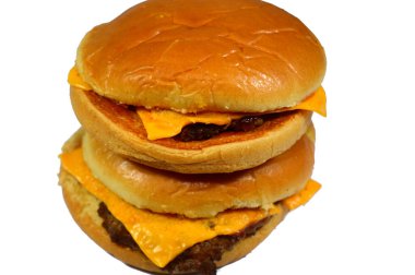 Çizburger, köftenin üzerine erimiş peynir dilimlenmiş bir hamburger, pişirme zamanının sonuna doğru mayonez, ketçap ve bir dilim domates ve seçici odaklı