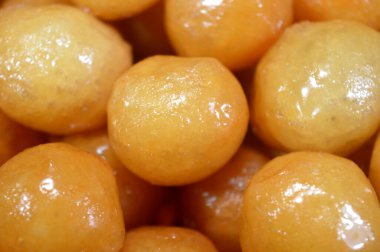 Zalabia tatlısı, bir çöreğe benzer bir orta doğu kızarmış hamuru, herhangi bir bayram partisinde sunulacak lezzetli bir tatlı, ballı şekerli tatlı yiyecekler, Zalabya