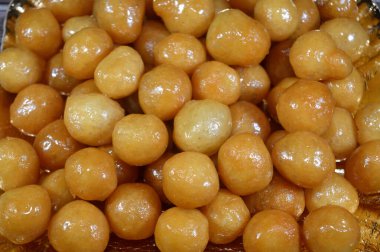 Zalabia tatlısı, bir çöreğe benzer bir orta doğu kızarmış hamuru, herhangi bir bayram partisinde sunulacak lezzetli bir tatlı, ballı şekerli tatlı yiyecekler, Zalabya