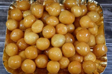 Zalabia tatlısı, bir çöreğe benzer bir orta doğu kızarmış hamuru, herhangi bir bayram partisinde sunulacak lezzetli bir tatlı, ballı şekerli tatlı yiyecekler, Zalabya