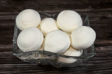 Marshmallows, marshmallow is a confectionery made from sugar, water and gelatin whipped to a solid-but-soft consistency, its naming comes from mallow plant species (Althaea officinalis), pile of candy