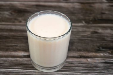 Yogurt drink with strawberry taste, fermented milk drink, a glass of Yoghurt drink, it is popular in many countries and with multiple various names, selective focus