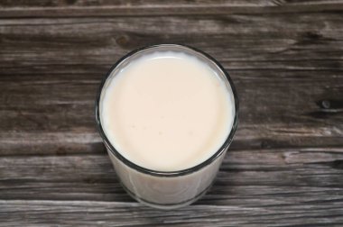 Yogurt drink with strawberry taste, fermented milk drink, a glass of Yoghurt drink, it is popular in many countries and with multiple various names, selective focus