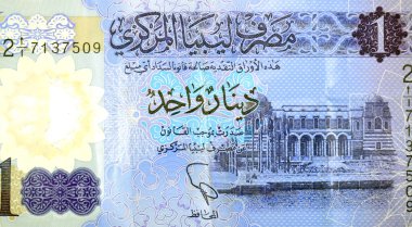 Libya merkez bankası tarafından hazırlanan 1 LYD bir Libya dinar nakit para banknotu faturasının büyük bir kısmında Libya Merkez Bankası (Trablus), Libya para ve ekonomi konsepti yer alıyor.