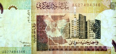 Sudan Merkez Bankası tarafından 1 SDG bir Sudan nakit para banknotu ters tarafında büyük bir parça, Sudan Bankası binası, Hartum, Sudan para ve ekonomi konsepti içerir.