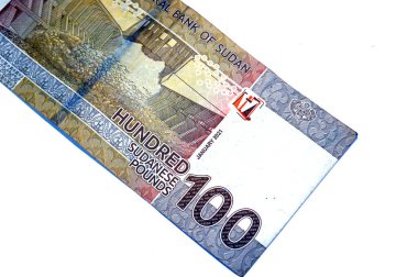 100 SDG 'nin ters tarafı 100 Sudan sterlini nakit para banknotu, Merowe hidroelektrik barajı, nehir Nil, 2009' da açılan CBOS amblemi, Lintels