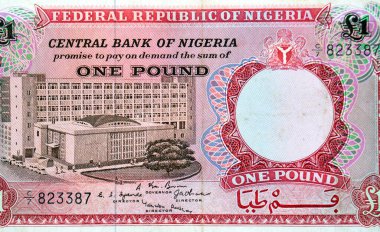 Nijerya merkez bankası tarafından hazırlanan 11.Nijerya nakit para banknotu banknotunun büyük bir kısmında Banka Binası, Nijerya Federal Cumhuriyeti para birimi, ekonomi durumu konsepti yer alıyor.